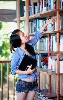 student with books